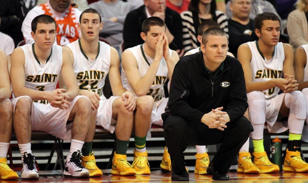 Eric Flannery watching play from the sideline with his St Edward High School team
